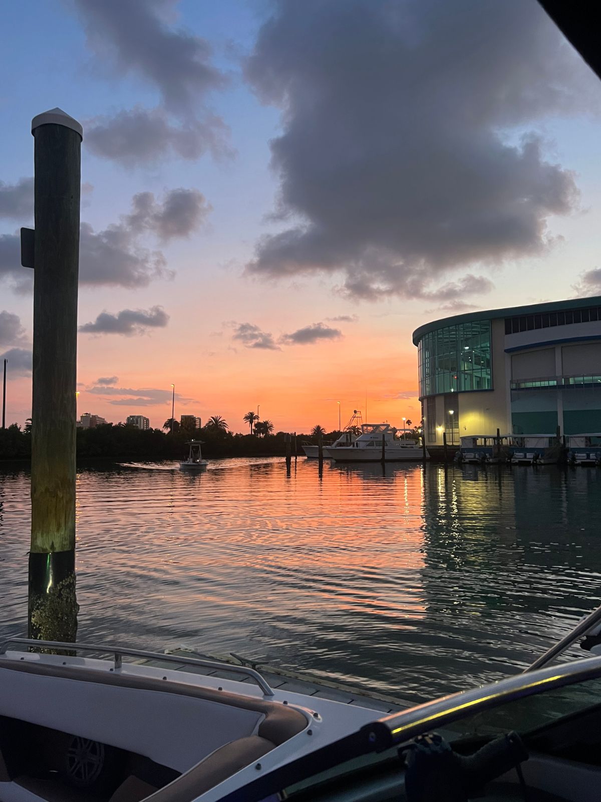 orange sunset seen from boat in clearwater